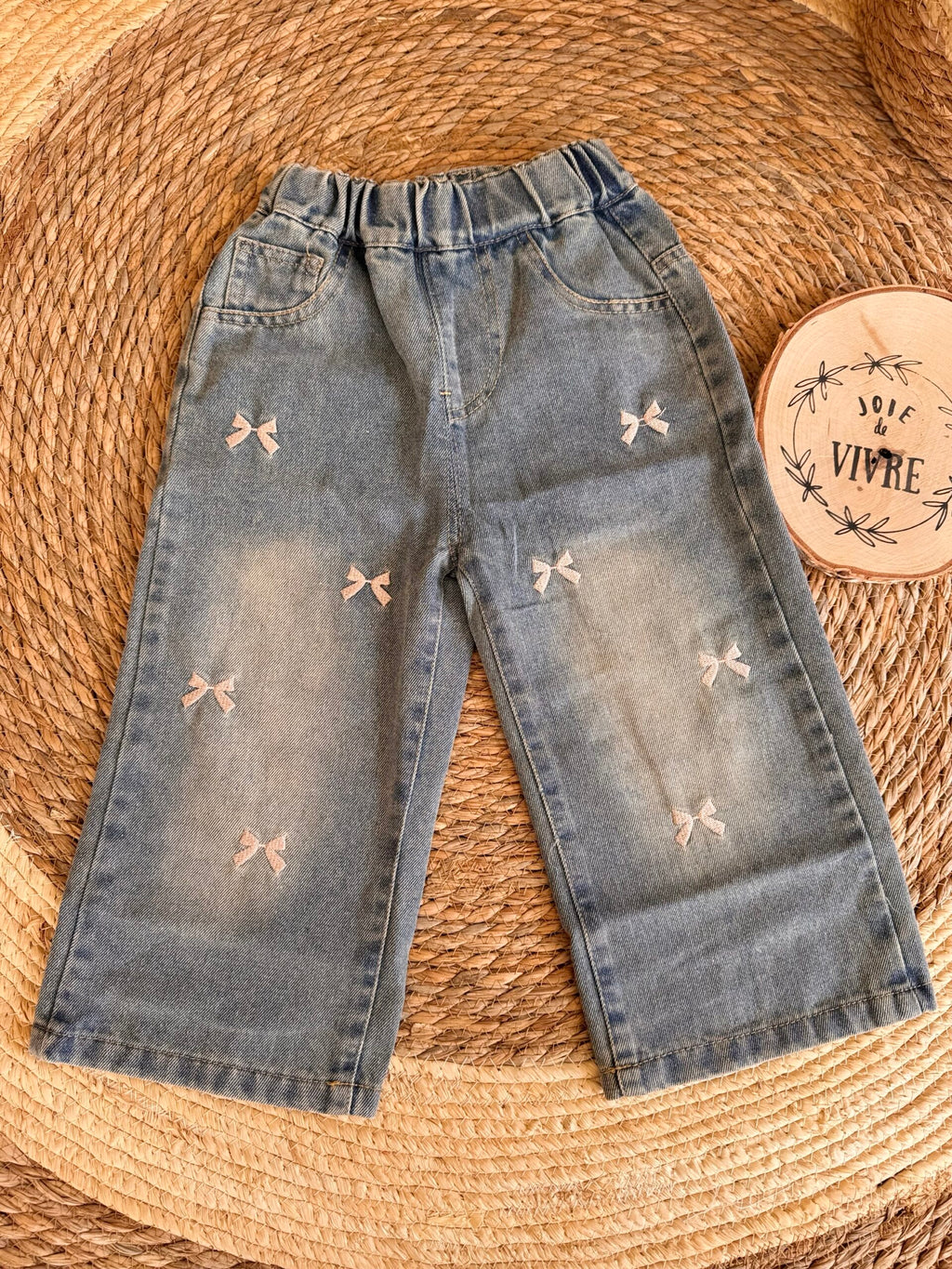 Pink ribbon jeans