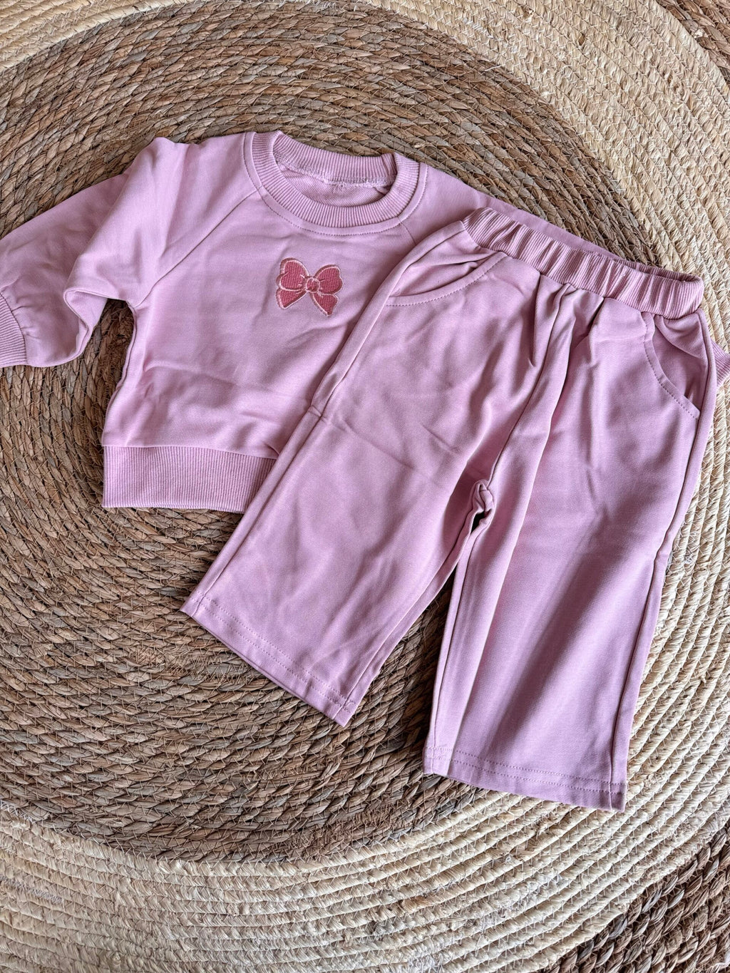 Pink ribbon tracksuits