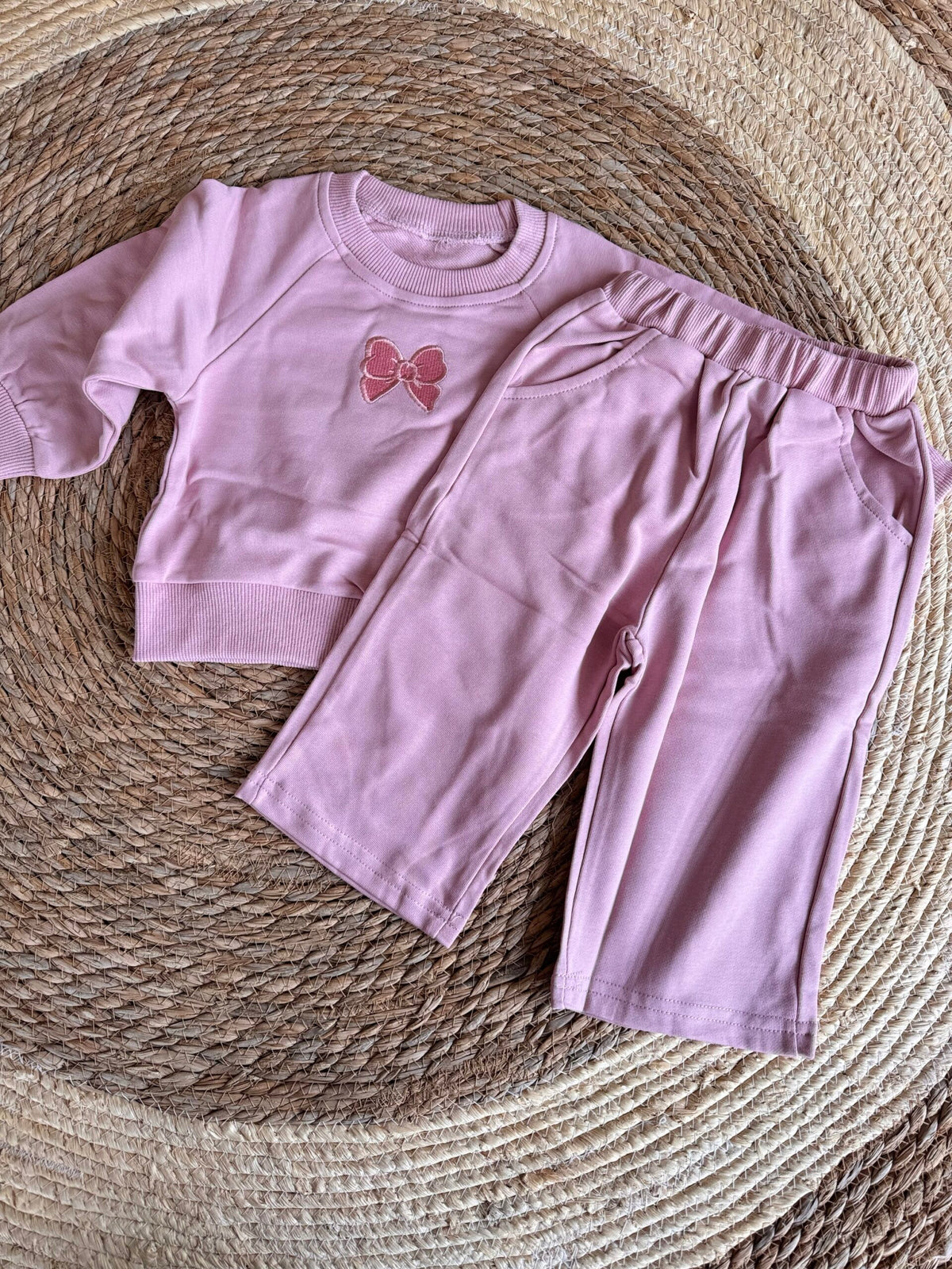 Pink ribbon tracksuits
