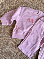 Pink ribbon tracksuits